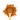 Wooden spoon of Organic Cinnamon on a white background.