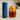 Blue insulated mug with 'Full Leaf Tea Co.' branding next to a glass pitcher of iced tea on a kitchen counter.