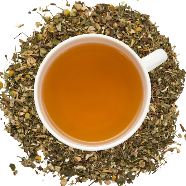 White cup of tea surrounded by GLTEA herbs on a white background