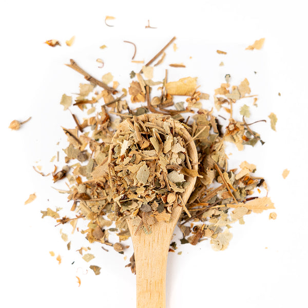 Wooden spoon of Organic Linden Leaf on a white background.
