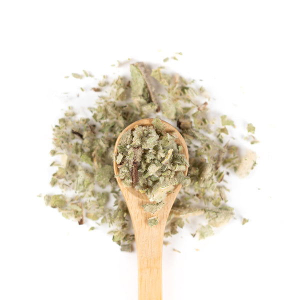 Wooden spoon of Organic Mullein on a white background.
