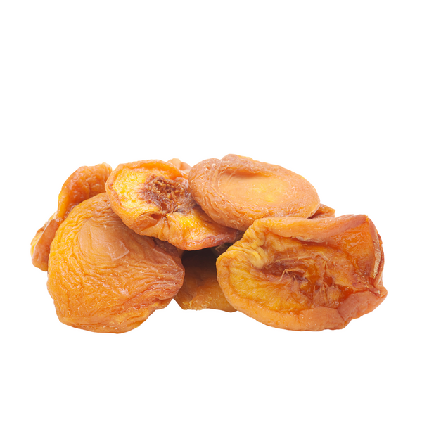 Dried peaches on a white background