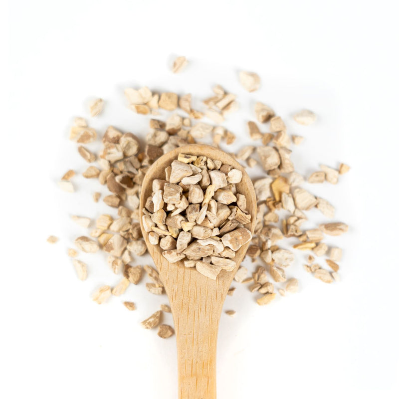 organic ashwagandha in wooden spoon