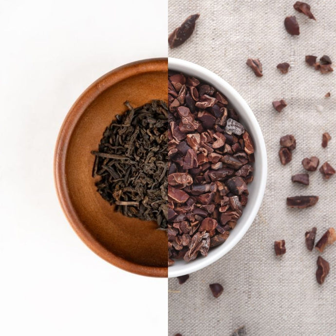 Two bowls containing different types of dried fruits or herbs, one on a white background and the other on a textured surface.