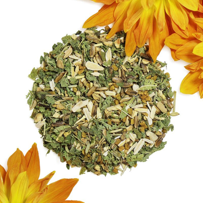 Lacatation Herbal mix with orange flowers on a white background
