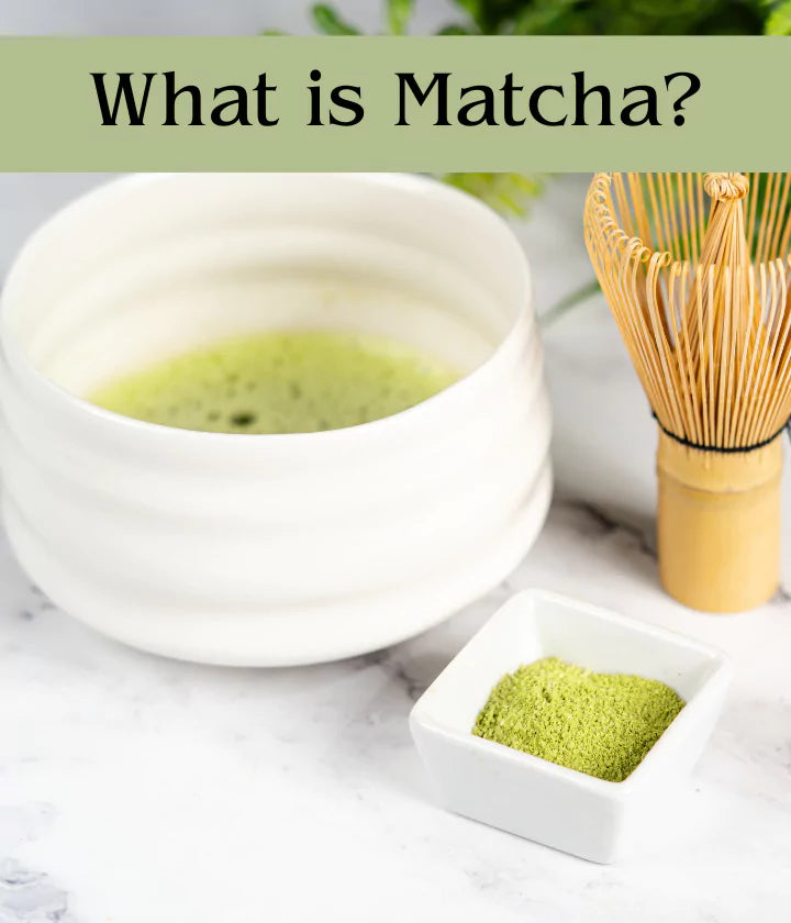 Image with matcha sitting in dish, matcha tea in mug, matcha whisk and text stating 'What is Matcha?' linking to our What is Matcha page. 
